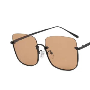 Oversized brown sunglasses for women with slimming square frames and tea lenses