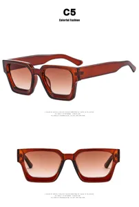 Amber retro square sunglasses for women with thick transparent frame and brown lenses.