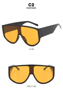 Oversized shield sunglasses with black frames and orange lenses in side and front views