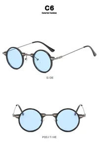 Detail der Retro-Steampunk-Rund-Sonnenbrille mit blauen Gläsern und schwarzem Rahmen.