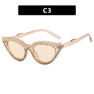 Fashionable champagne cat-eye sunglasses for women with elegant rhinestone embellishments