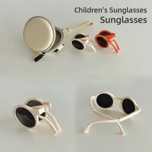 Faltbare Kindersonnenbrille mit rundem Rahmen und tragbarem Brillenetui