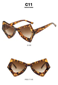 Detailed view of retro oversized irregular butterfly glasses in tortoiseshell pattern