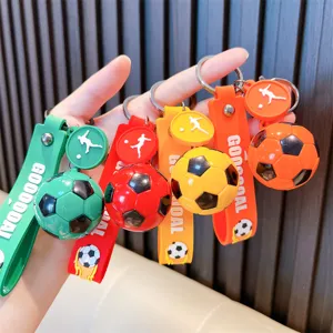 Vibrant soccer ball keychains in four colors with silicone goal straps for bag charms.