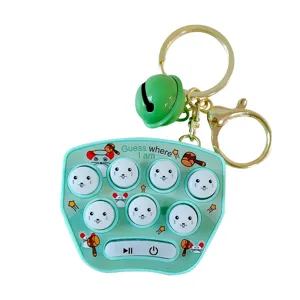 Portable mini whack-a-mole game keychain for kids stress relief in light green color