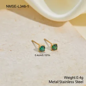 Detail view of 0.4cm green zircon stud earrings in gold stainless steel finish.