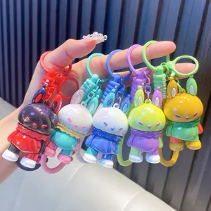 Five colorful dopamine-style rabbit doll keychains with spring silicone straps.