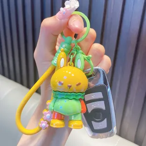 Vibrant dopamine-style silicone rabbit keychain and car key accessory charm in green and yellow