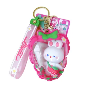 Adorable white rabbit keychain with pink strawberry air bag charm and Sweet strap accessory