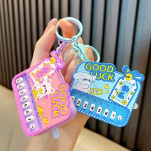 Creative mini piano keychain toy with music and light features in pink and blue colors