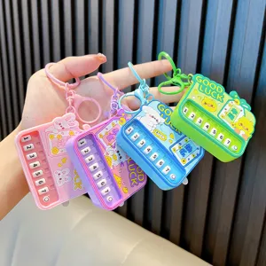 Creative mini glowing piano keychain and handheld music game machine toy in four colors