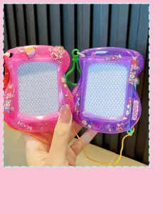 Detailed view of mini magnetic drawing board keychains in pink and purple shades