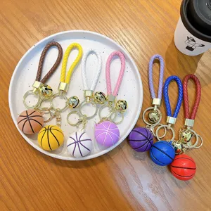 Set di mini portachiavi da basket colorati con cinturini intrecciati e campanellini