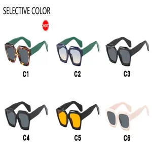 Fashionable oversized sunglasses available in six color variants including Klein blue and pink