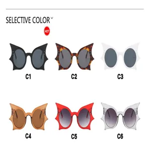 Selective color display of trendy bat-shaped Halloween sunglasses for costume parties