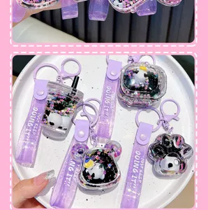 Detailed view of cute panda liquid quicksand keychains with purple glitter straps