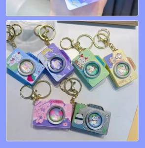Llaveros de cámara de dibujos animados de colores con lindos animales para mochilas infantiles.