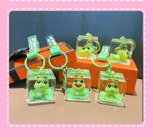 Juego de seis adorables llaveros de rana verde rellenos de aceite con varias poses divertidas