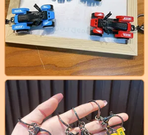Detail view of colorful ATV motorcycle keychains with metal ring attachments