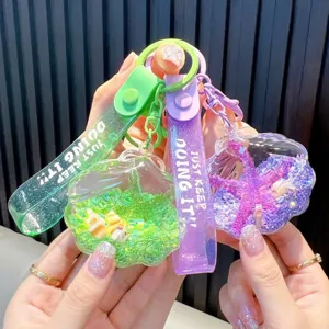 Ozean Meer Seestern Muschel Flüssiger Treibsand Schlüsselanhänger Süß Acryl Ölflasche Beweglicher Glitzer Tasche Anhänger Für Damen Kinder