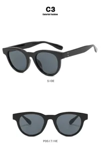 Vista lateral y frontal de gafas de sol vintage ojo de gato negras para mujer con lentes