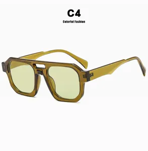 Detailansicht einer Retro-Pilotenbrille mit transparentem olivgrünem Rahmen.