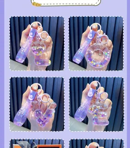 Detailed view of purple liquid-filled alphabet LOVE keychains with glitter and flower charms