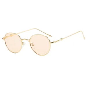 Stylish 2024 minimalist round gold metal sunglasses with chic peach tinted lenses for women