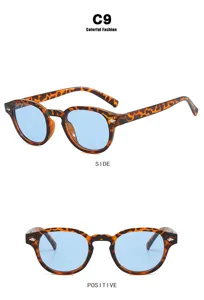 Gafas de sol redondas retro de carey con lentes azules, vista lateral y frontal