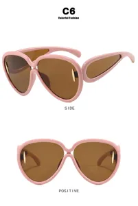 Detailed multi-angle views of pink futuristic oversized sunglasses with brown lenses