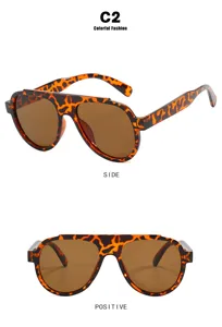 Detailansicht der stylischen Flieger-Sonnenbrille mit Leopardenmuster und braunen Gläsern.