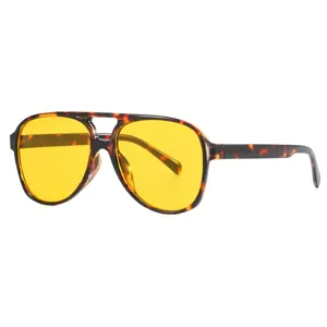 Stylish retro oversized aviator sunglasses with tortoiseshell frame and yellow tinted lenses