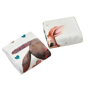 Folded baby milestone blankets with cute animal prints and soft flannel texture