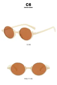 Vintage ronde zonnebril voor dames en heren, stijlvol beige montuur met mooie details.