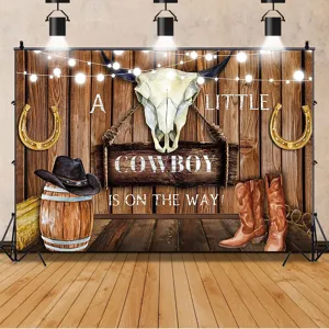 Sfondo fotografico per baby shower cowboy con teschio di toro e design con stivali