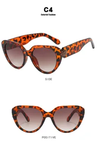 Dames zonnebril met luipaardprint, cat-eye design en juweeldetail in zij- en vooraanzicht