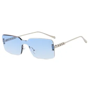 Gafas de sol cuadradas sin montura con lentes azules degradadas y varillas de metal plateado