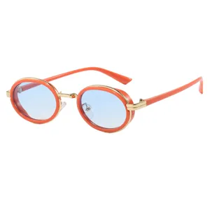 Lunettes de soleil steampunk ovales rétro chic avec monture orange et verres bleus clairs