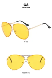 Retro oversized aviator sunglasses with yellow lenses and gold metal frame design