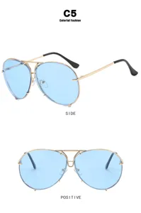 Vintage aviator sunglasses with blue lenses and gold metal frame front and side views
