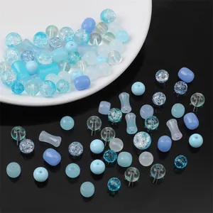 Detailed assortment of blue glass beads with various textures and shapes for jewelry DIY