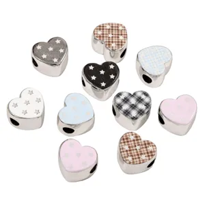Assorted star patterned heart spacer beads for DIY jewelry making in silver finish