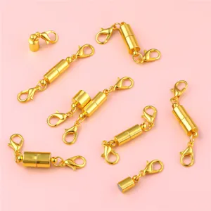 Detailed view of gold-plated magnetic lobster clasps for custom DIY jewelry making.