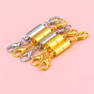 Close-up detail view of magnetic lobster clasps in gold and silver for DIY jewelry making