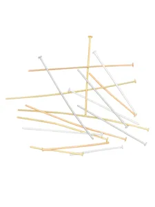 Detailed macro view of assorted gold silver and rose gold metallic jewelry T-head pins