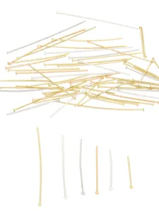 Detailed macro view of gold and silver T-pins for DIY jewelry making in various sizes
