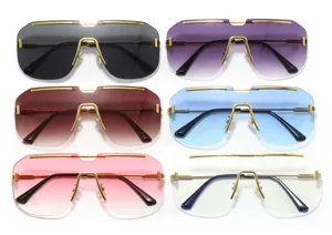 Oversized rimless square sunglasses with gold metal bridge and rivet details in six colors