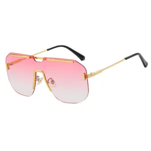 Oversized rimless square sunglasses with pink gradient lens and gold rivet accents