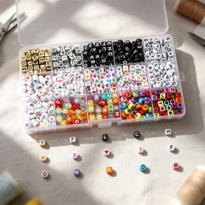 Detailed view of multicolor acrylic alphabet and heart beads in a plastic storage box