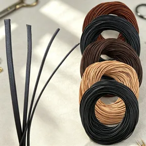 Macro detail showing multi-colored round faux leather cords for DIY jewelry craft making.